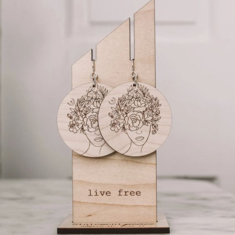 Woman in Flora and Fauna Earrings
